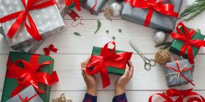 christmas gifts wrapped with roofing tools in them