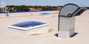 flat commercial roof with drainage solution