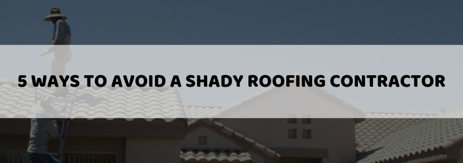 Roofing Contractors Repairing A Roof