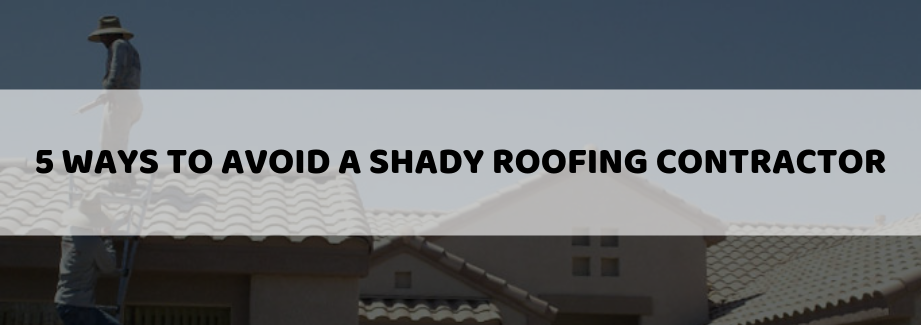 Roofing Contractors Repairing A Roof 